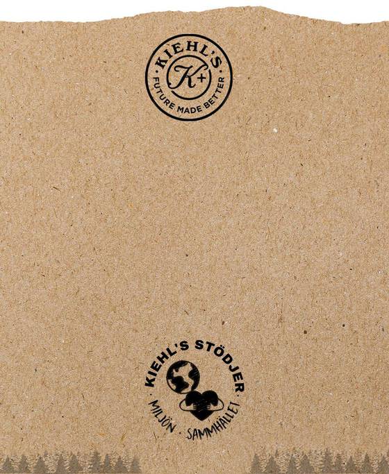 Alt-text: Logotyper från Kiehl's på en textur av brunt papper med skogssiluett i bakgrunden.