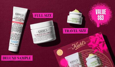 En grafik, mot en morkrod texturerad bakgrund, visar tre produkter och en presentask. En vit tub med "KIEHL’S ULTRA FACIAL BARRIER-HYDRATING CLEANSER" ar markt "DELUXE SAMPLE" i ljusrosa. En vit burk med "KIEHL’S ULTRA FACIAL CREAM" ar markt "FULL SIZE" i ljusrosa. En liten vit burk med "KIEHL’S CREAMY EYE TREATMENT WITH AVOCADO" med synlig blekgul kram ar markt "TRAVEL SIZE" i ljusrosa. I det nedre hogra hornet syns en rod Kiehl’s presentask som visar samma tre produkter, dekorerad med ljusrosa grafiska fargstank och en rosettdesign. I det ovre hogra hornet innehåller en ljusrosa fargstank texten "VALUE $63."