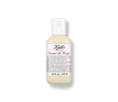 A small bottle of Kiehl's Creme de Corps body moisturizer, labeled with product details, 4.2 fl oz size.