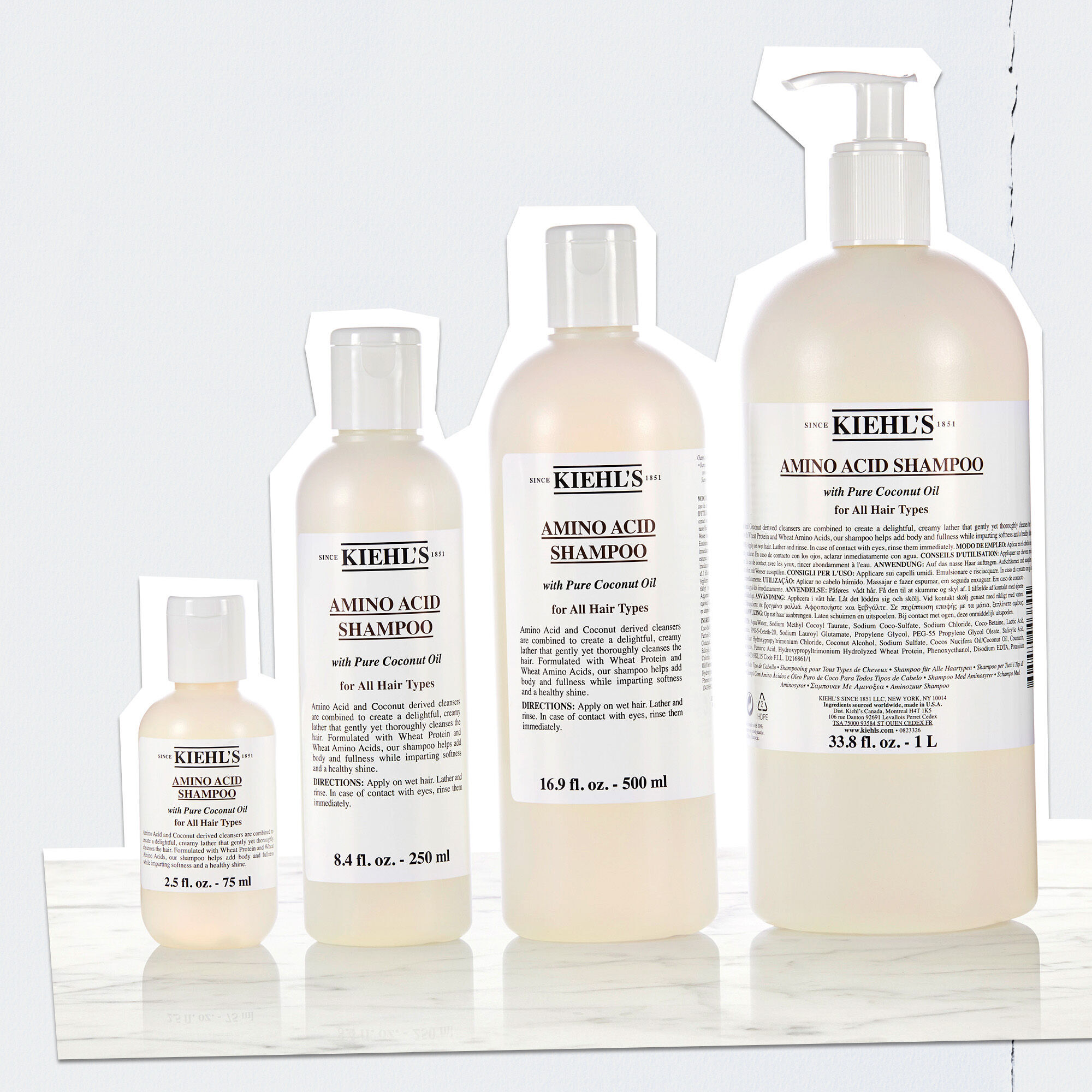 Sortiment av Kiehl's Amino Acid Shampoo-flaskor i olika storlekar