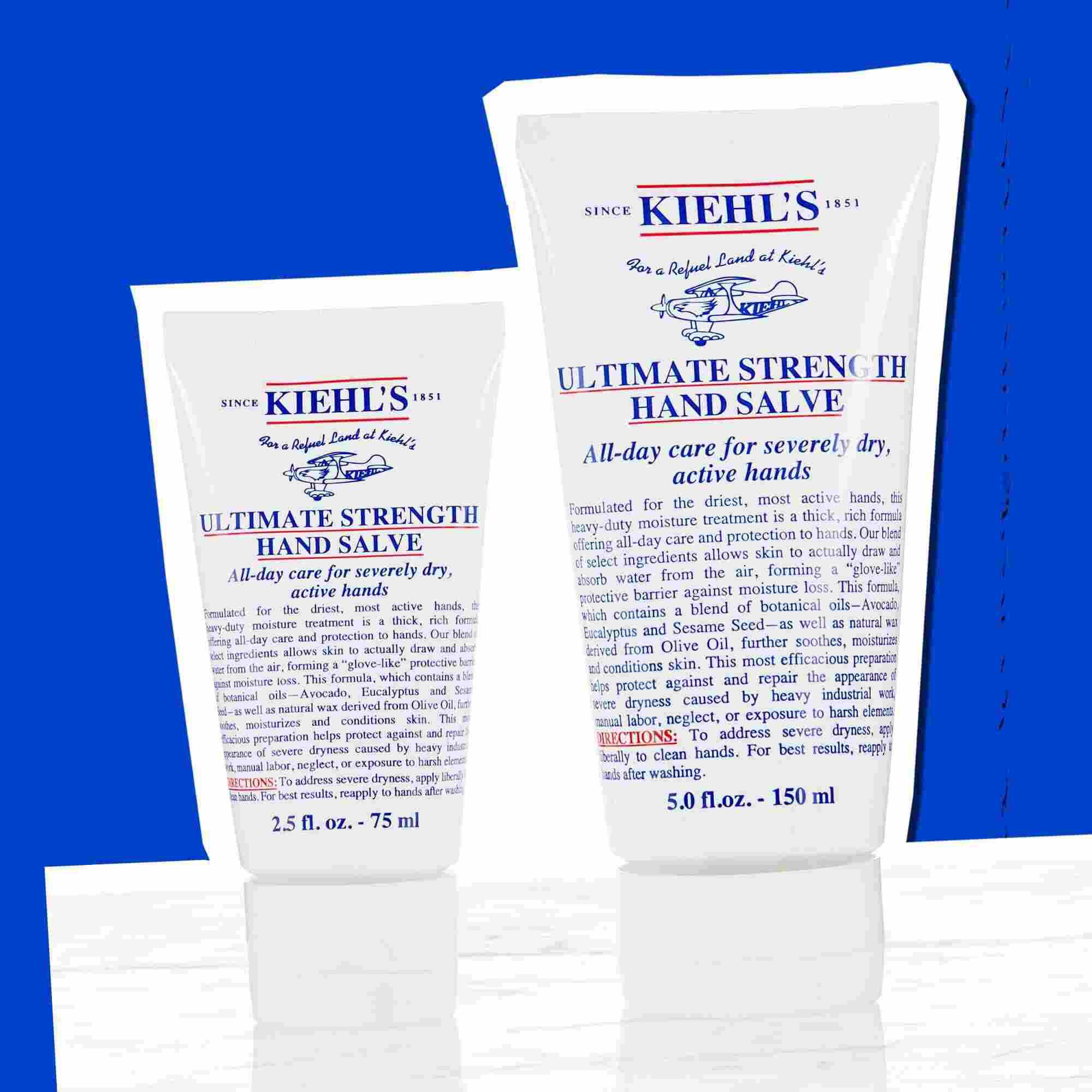 Två tuber med Kiehl's Ultimate Strength Hand Salve som visar tillgangliga storlekar
