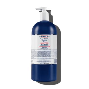 En flaska Kiehl's Body Fuel All-In-One Energizing Wash mot en vit bakgrund.