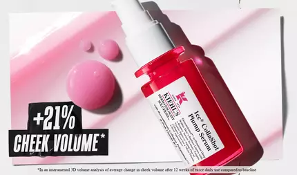 Kiehls 1cc CollaShot Plump Serum-flaska med +21% kindvolym, markerad mot en rosa bakgrund med serumdroppar