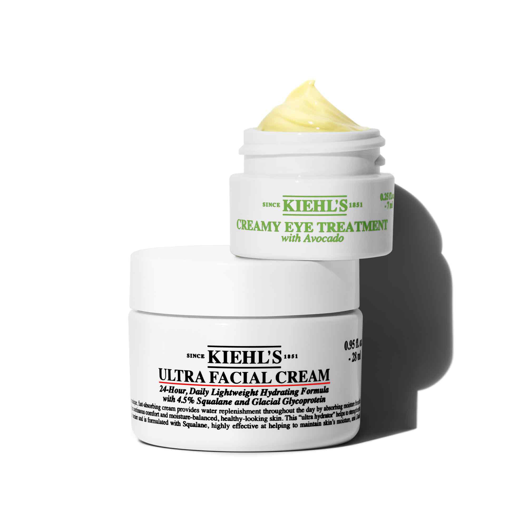 Kiehl's Creamy Eye Treatment med avokado och Ultra Facial Cream, som erbjuder återfuktande losningar for ogon och ansikte.