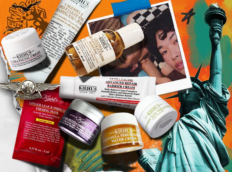 Ett sortiment av Kiehl's hudvårdsprodukter konstfullt arrangerade på en livlig orange bakgrund som föreställer Frihetsgudinnan.